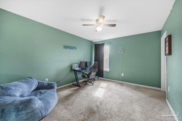 home office featuring ceiling fan and carpet flooring