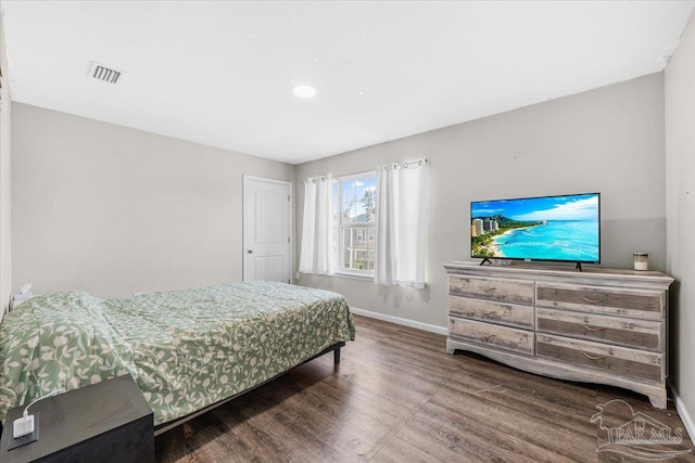 bedroom featuring hardwood / wood-style flooring