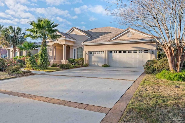 view of front of property with a garage