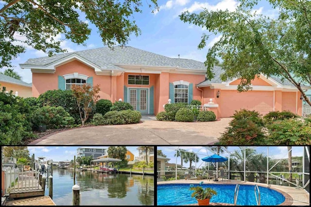 1129 Seabreeze Ln, Gulf Breeze, FL 32563 - exterior space with a lanai, a water view, french doors, and a boat dock