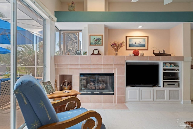 living room featuring a fireplace and tile patterned flooring