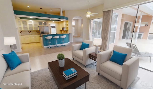1129 Seabreeze Ln, Gulf Breeze, FL 32563 - living area with a ceiling fan, arched walkways, and recessed lighting