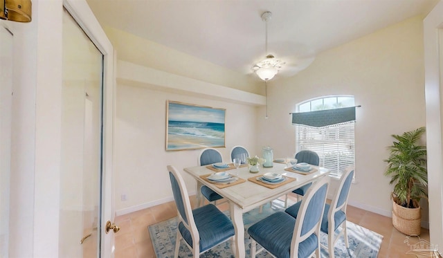 1129 Seabreeze Ln, Gulf Breeze, FL 32563 - dining room with light tile patterned flooring and baseboards