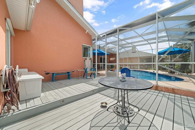 wooden deck with a lanai