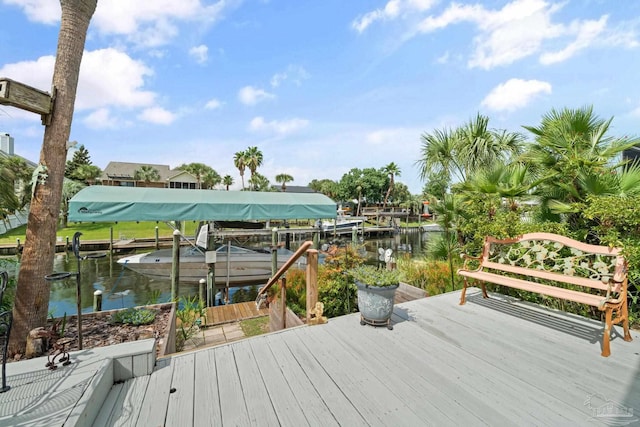 1129 Seabreeze Ln, Gulf Breeze, FL 32563 - wooden terrace featuring a water view, boat lift, and a boat dock