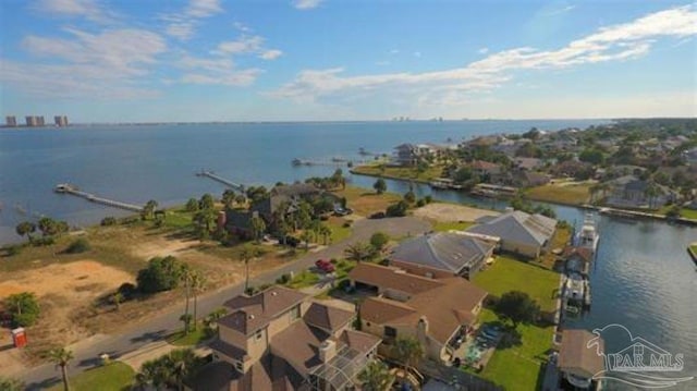 bird's eye view with a water view