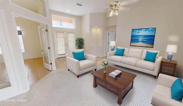 1129 Seabreeze Ln, Gulf Breeze, FL 32563 - living room featuring tile patterned flooring and visible vents