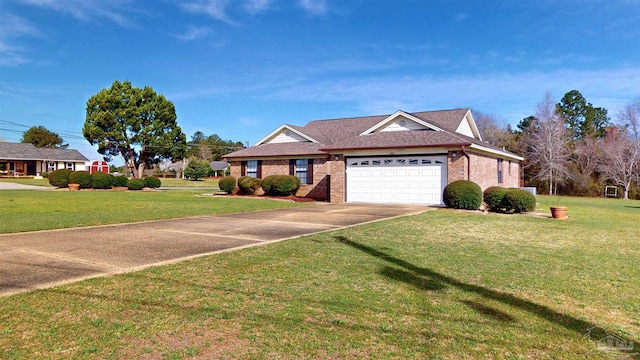 view of front of house featuring a garage and a front lawn