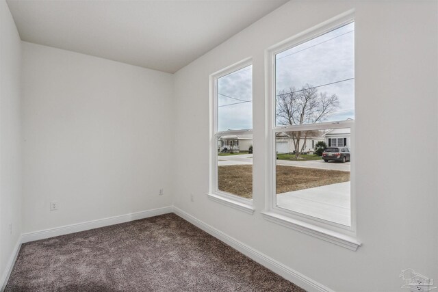 empty room with carpet floors