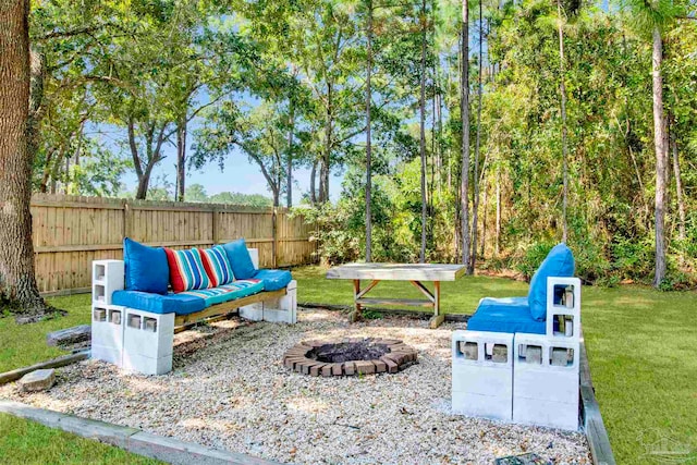 view of patio / terrace featuring an outdoor fire pit