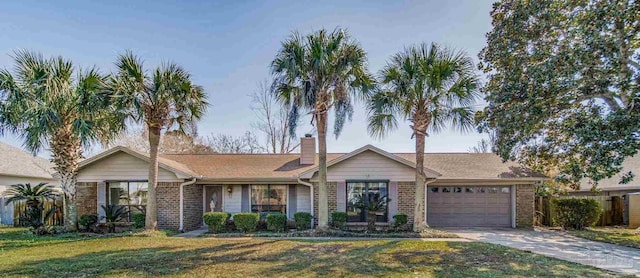 ranch-style house with a garage and a front yard