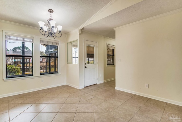 tiled empty room with crown molding, a textured ceiling, and an inviting chandelier