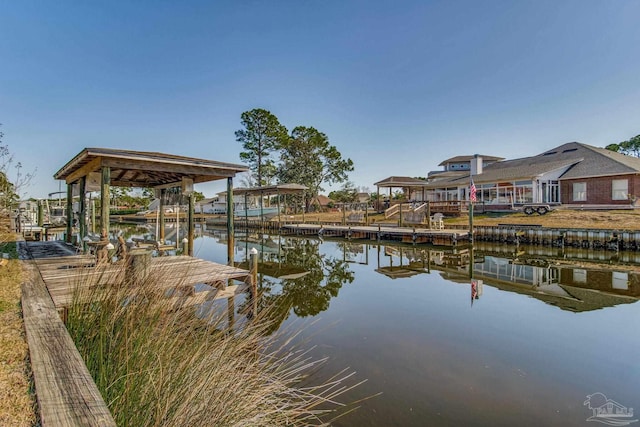 dock area featuring a water view