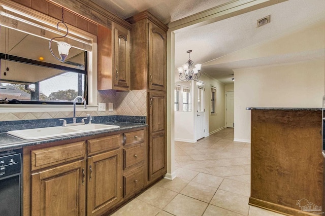 kitchen featuring sink, light tile patterned floors, ornamental molding, dishwasher, and decorative backsplash