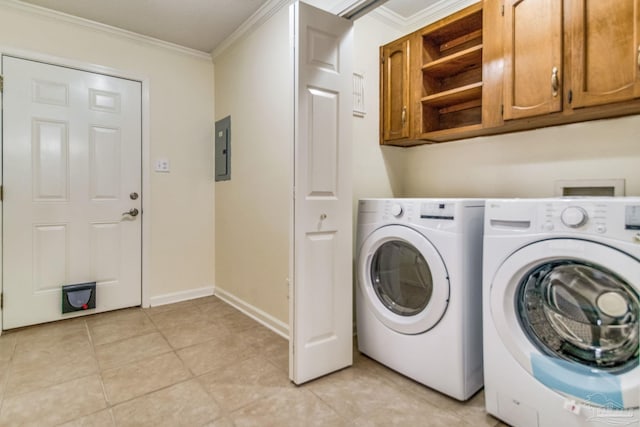 laundry area with cabinets, crown molding, washing machine and clothes dryer, and electric panel