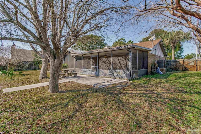 view of yard with a patio and a sunroom