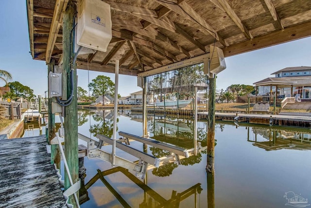 view of dock with a water view