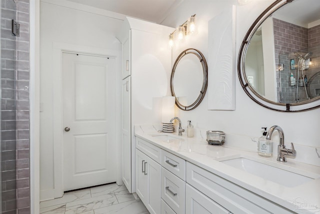 bathroom featuring vanity and walk in shower