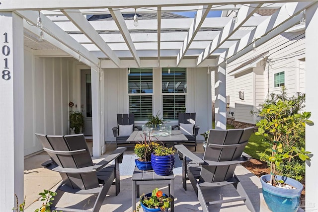 view of patio / terrace featuring a pergola and an outdoor living space