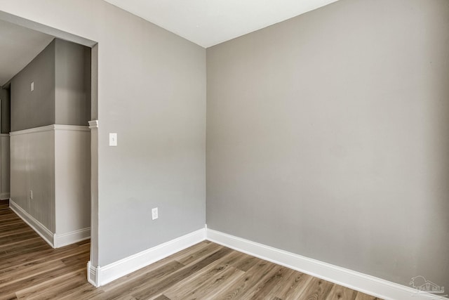 unfurnished room featuring wood-type flooring