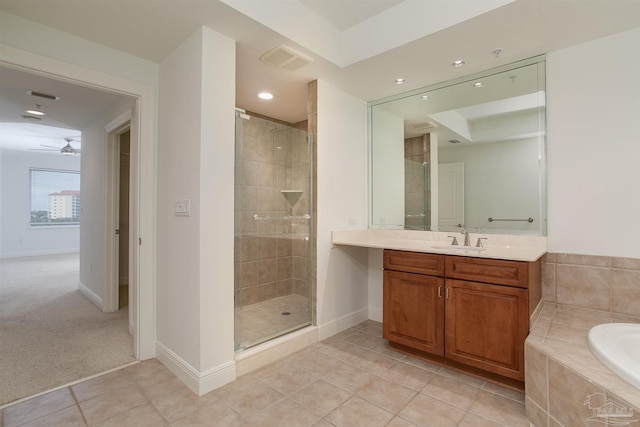 bathroom featuring tile patterned flooring, vanity, separate shower and tub, and ceiling fan