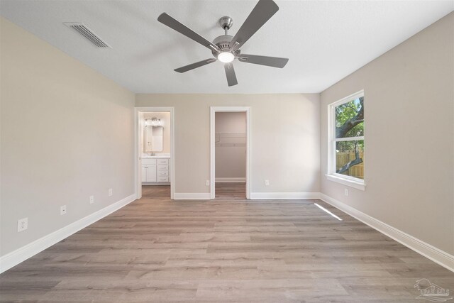 4485 Edgewood Dr, Milton, FL 32583 - unfurnished bedroom with light wood-style flooring and baseboards