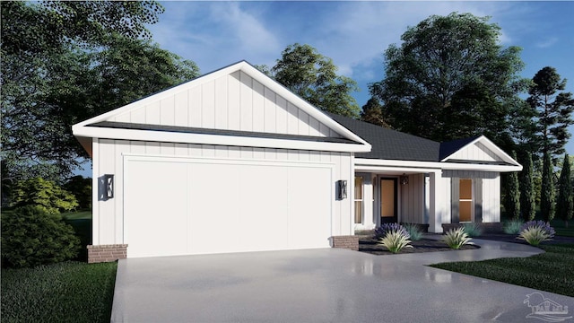 4485 Edgewood Dr, Milton, FL 32583 - view of front facade featuring board and batten siding, concrete driveway, and an attached garage