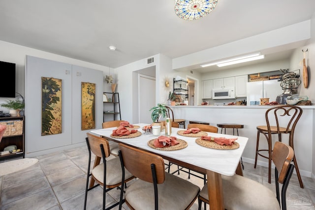 14259 Perdido Key Dr Unit 1C, Pensacola, FL 32507 - dining space with visible vents