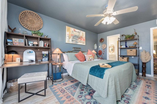 14259 Perdido Key Dr Unit 1C, Pensacola, FL 32507 - bedroom featuring ensuite bath, wood finished floors, and baseboards