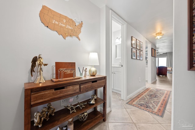 14259 Perdido Key Dr Unit 1C, Pensacola, FL 32507 - hallway with light tile patterned floors and a sink