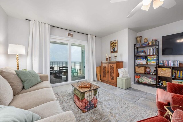 14259 Perdido Key Dr Unit 1C, Pensacola, FL 32507 - living room with ceiling fan and tile patterned flooring