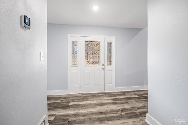 foyer featuring dark hardwood / wood-style flooring