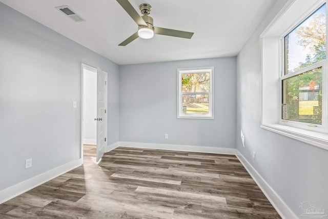 unfurnished room featuring ceiling fan and hardwood / wood-style floors