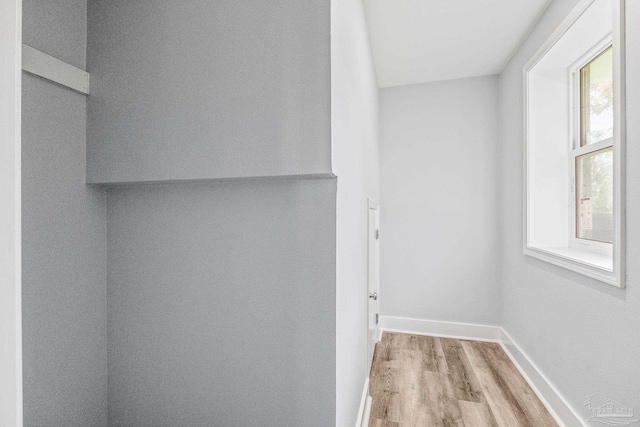 hallway featuring light wood-type flooring