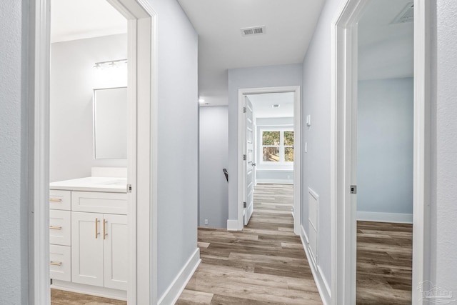 hall featuring light wood-type flooring