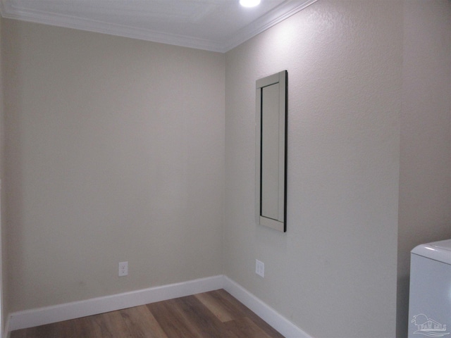 unfurnished room featuring crown molding and dark hardwood / wood-style floors