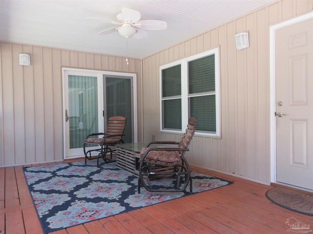 wooden terrace with ceiling fan