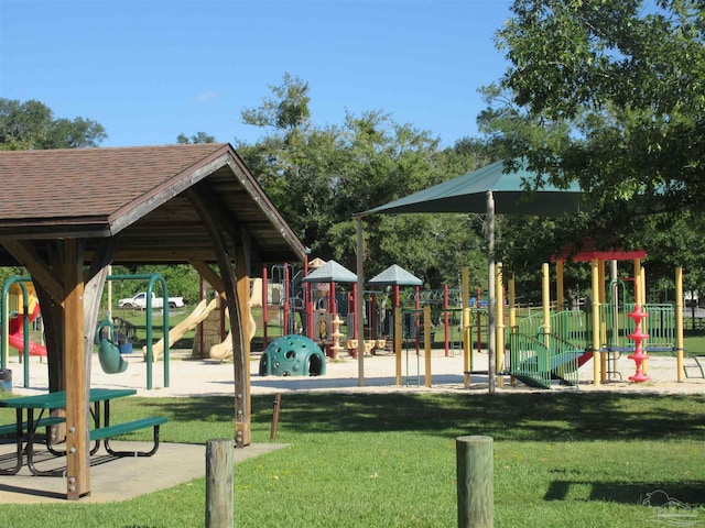 view of jungle gym with a yard