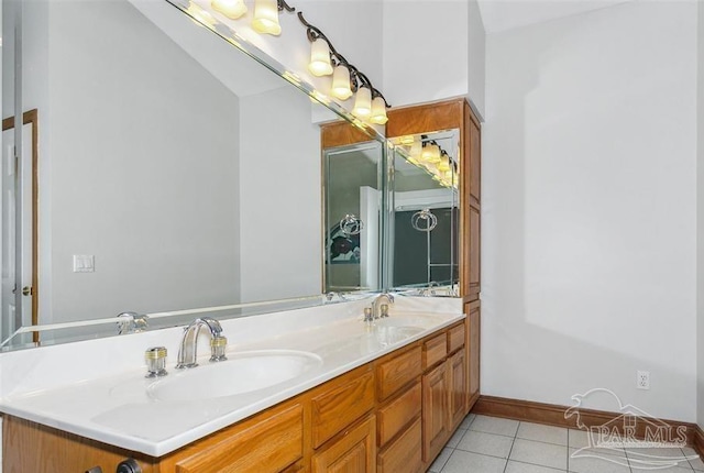 bathroom featuring tile patterned floors and vanity