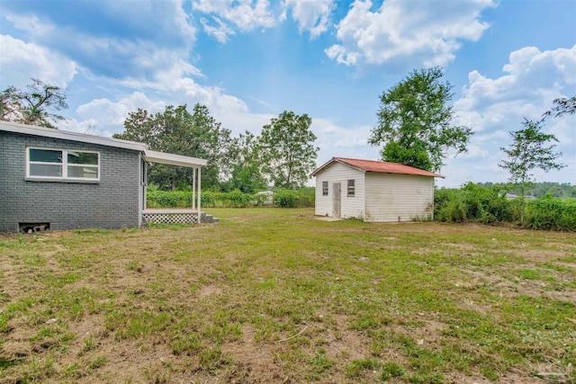 2511 Green Village Rd, Walnut Hill, FL 32568 - view of yard featuring an outdoor structure