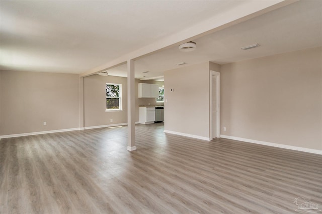 2511 Green Village Rd, Walnut Hill, FL 32568 - empty room with light wood-type flooring, baseboards, and visible vents