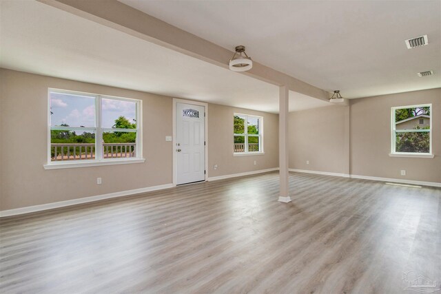 2511 Green Village Rd, Walnut Hill, FL 32568 - spare room featuring visible vents, baseboards, and light wood-style flooring