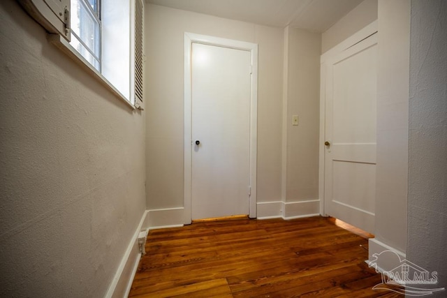 hall featuring dark hardwood / wood-style floors