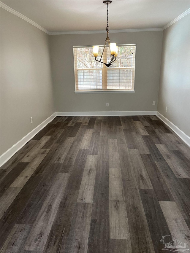unfurnished dining area with a chandelier, dark wood-style flooring, crown molding, and baseboards