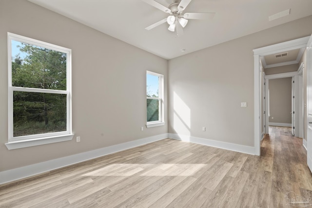 unfurnished room featuring ceiling fan and light wood-type flooring