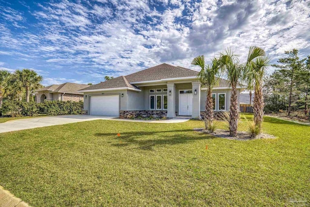 ranch-style house with a garage and a front yard