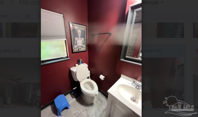 bathroom with vanity and toilet