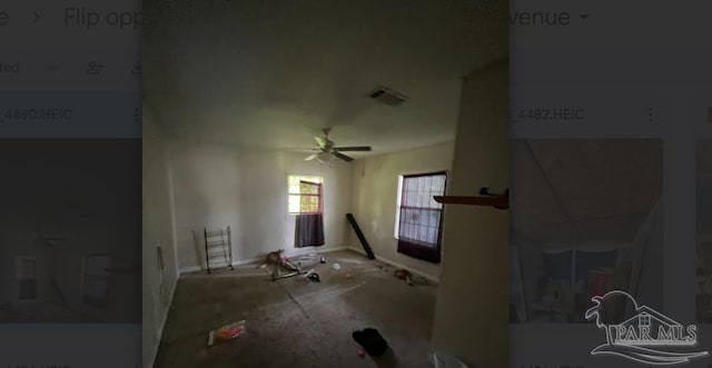 living room featuring ceiling fan