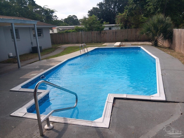 view of pool with central AC