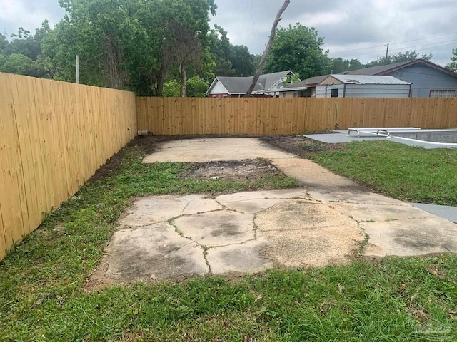 view of yard with a patio area